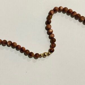 Chic Brown Beaded Necklace with Gold Accents